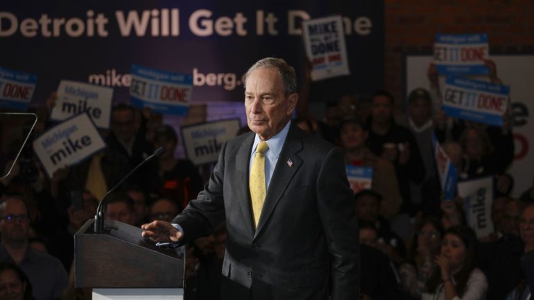 Candidates criticize Michael Bloomberg for his huge campaign spending