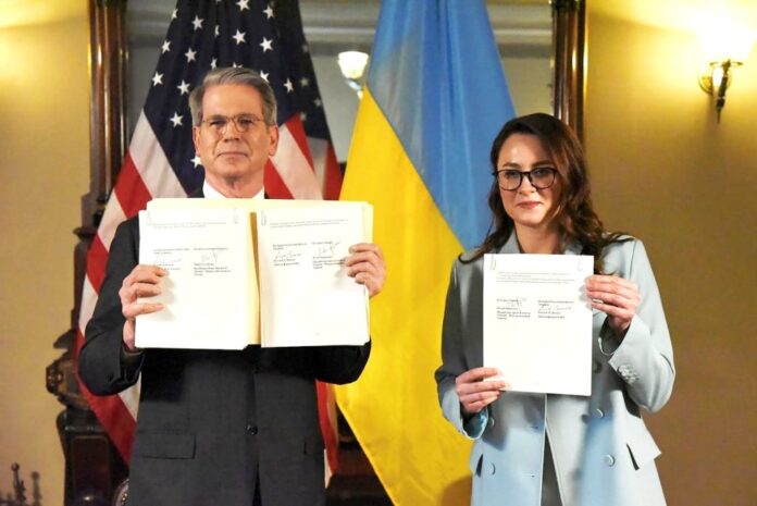 The US and Ukraine sign a critical minerals deal.