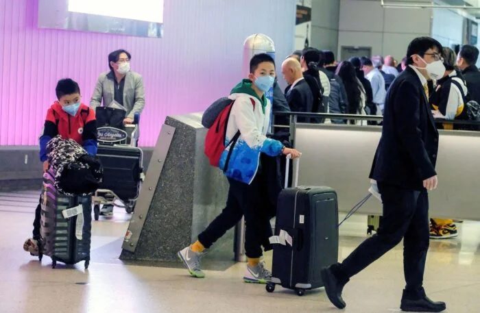 State Department and WHO official advised against nonessential travel to China