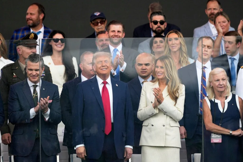 Trump celebrates $45 million military parade at a time of nationwide protests against his policies.